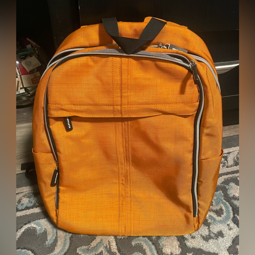 Stylish Orange Laptop/Backpack with Black Accents